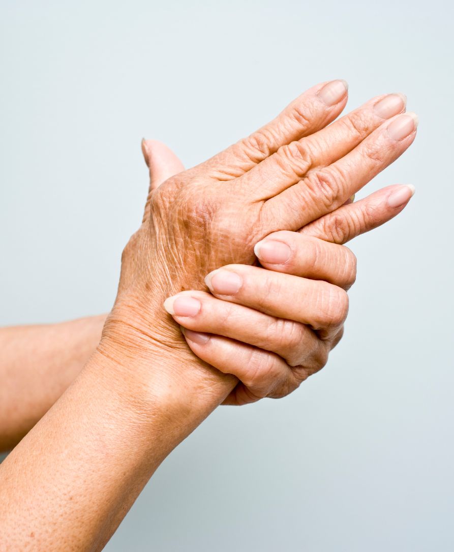 Chiropractor providing gentle arthritis relief treatment to help improve joint mobility