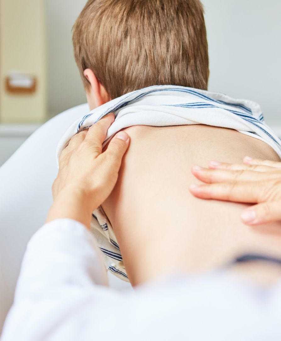 Child receiving chiropractic care