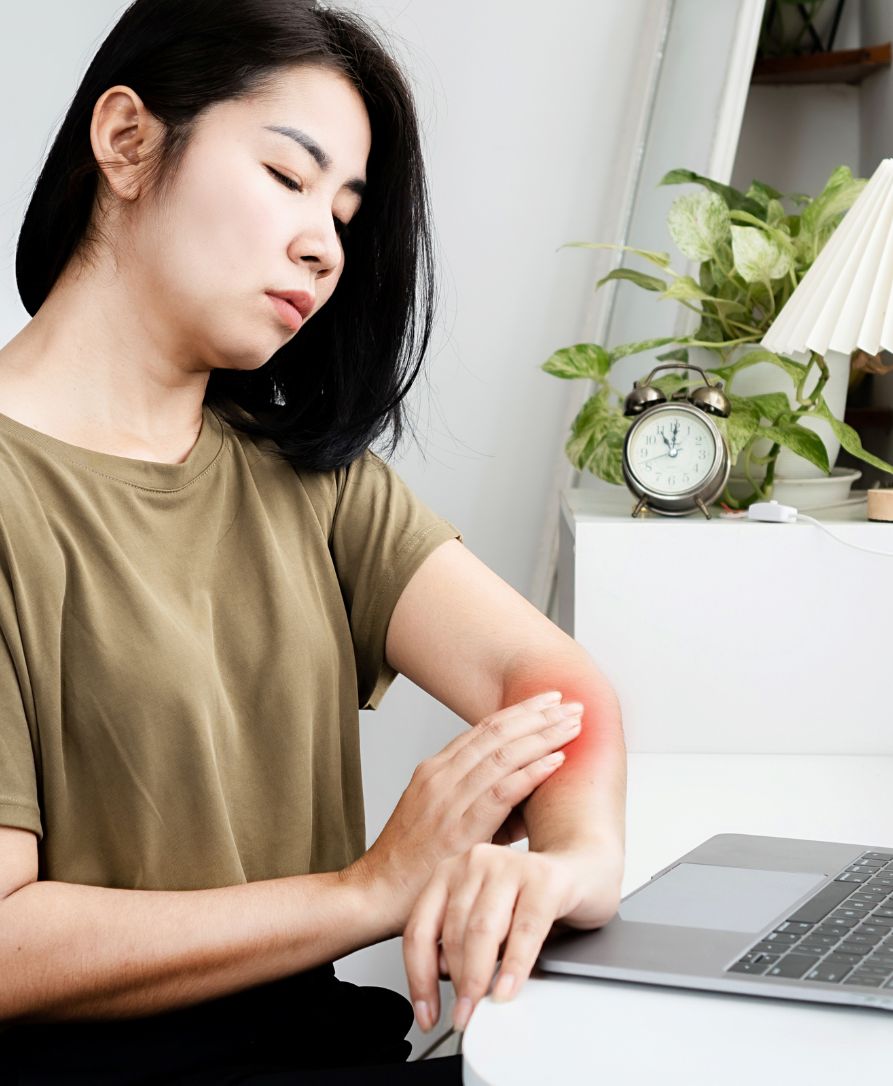 Chiropractor treating repetitive strain injury